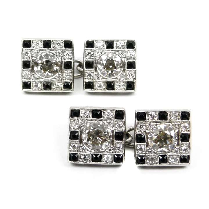 Pair of onyx and diamond square panel cufflinks, open set in platinum, four sides alike